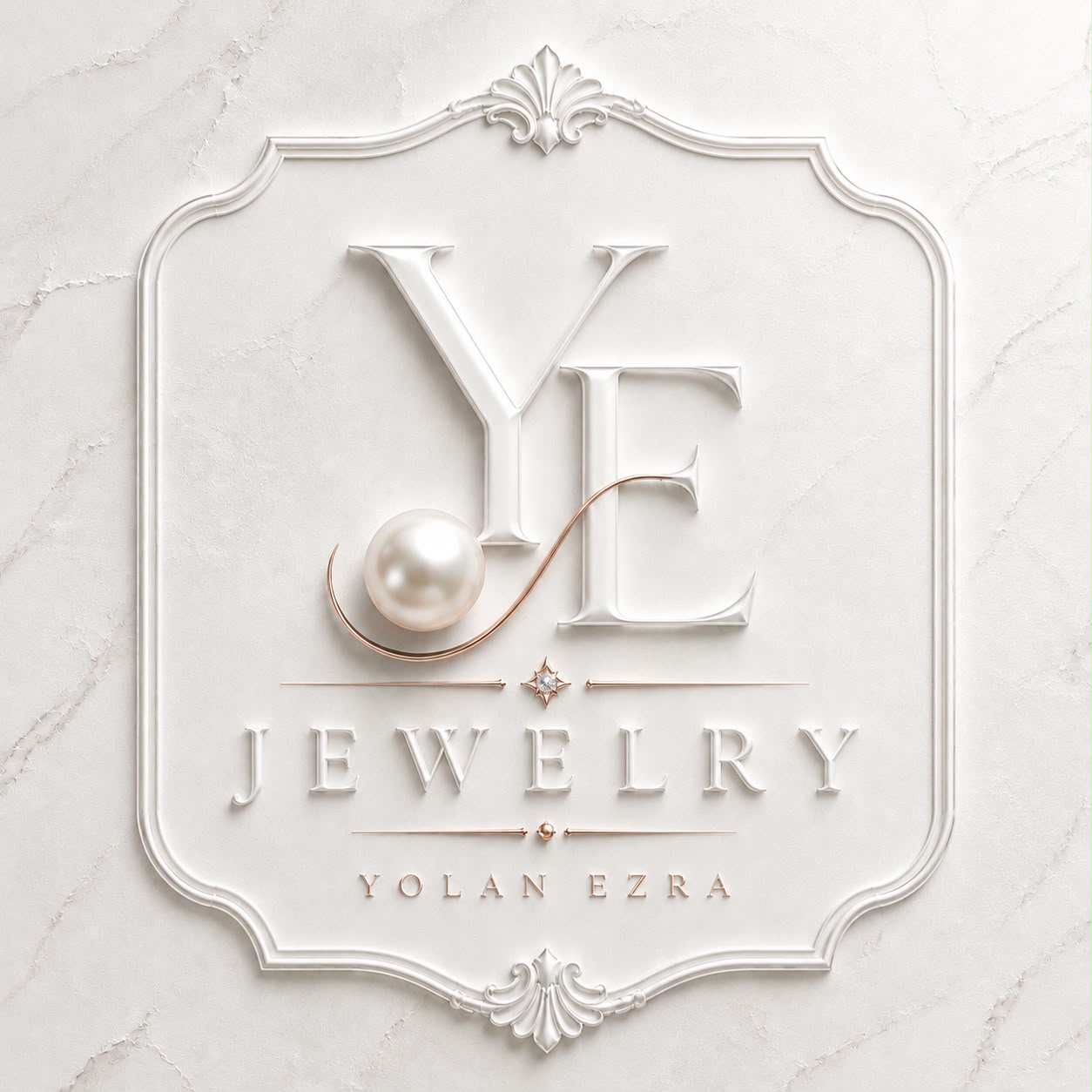 הלוגו של YOLAN JEWELRY — האותיות Y ו-E עם פנינה ושרשרת זהב ורוד